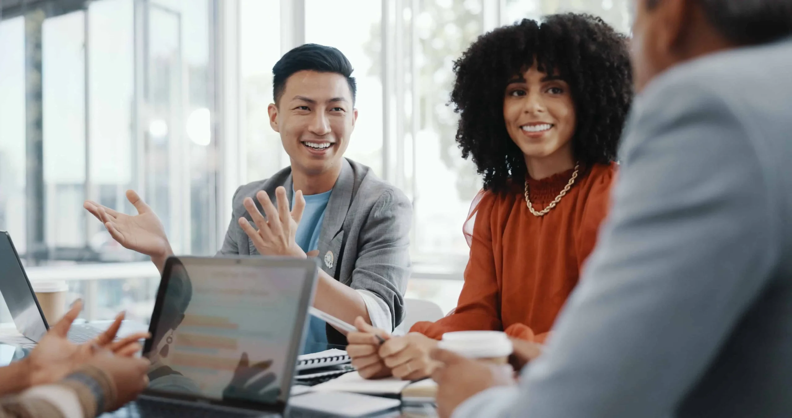 Diverse Group of Professionals in a Meeting, Engaging With Each Other and Having a Business Meeting About B2b Customer